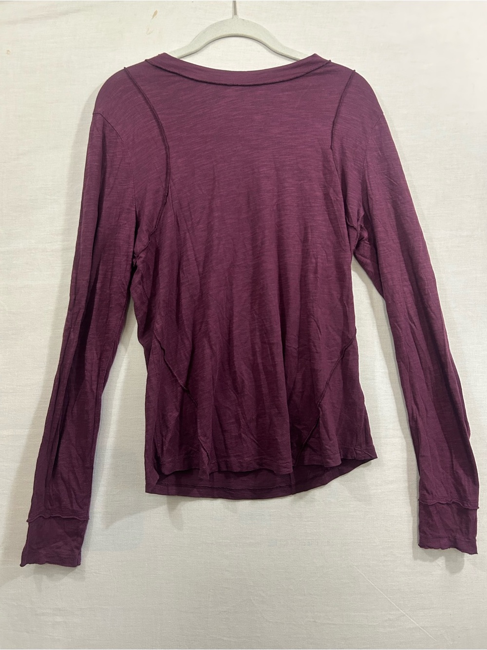 Plum Pilcro Stitched Long-Sleeve Top from Anthropologie.